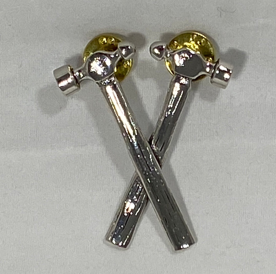 Crossed hammer pins